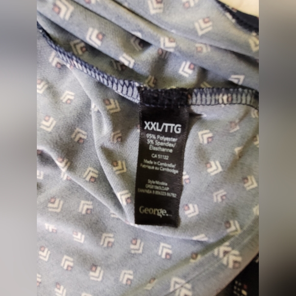 Navy blue with pink and white print blouse with 3/4 length sleeves and cutout - Picture 2 of 4